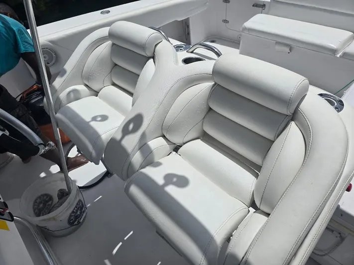  Yacht Photos Pics Luxury seating on a 2008 Donzi 38 ZSF boat, featuring plush white upholstery.