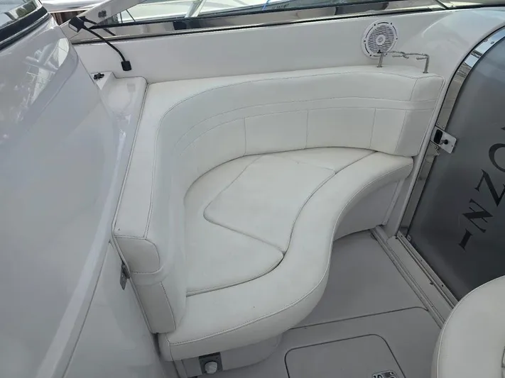  Yacht Photos Pics 2008 Donzi 38 ZSF boat interior with white leather seating and speaker.