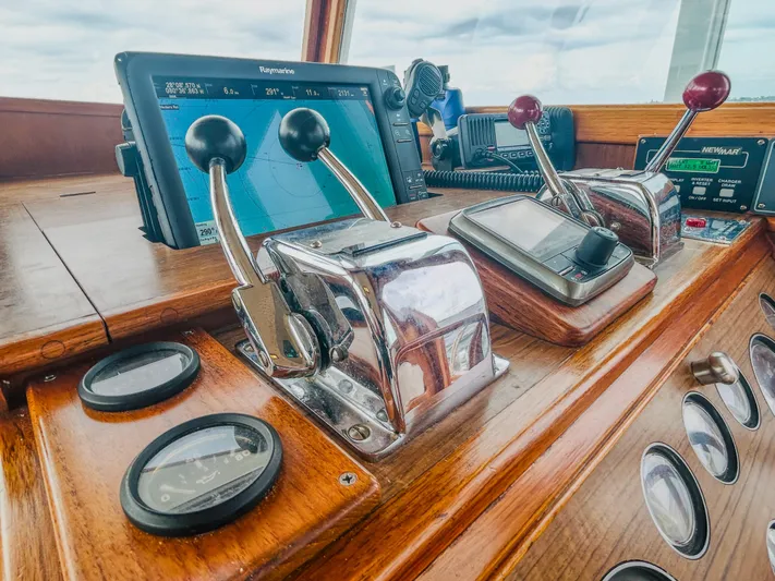 Mystic Yacht Photos Pics 1989 Grand Banks 36 Sedan helm with navigation equipment and controls.