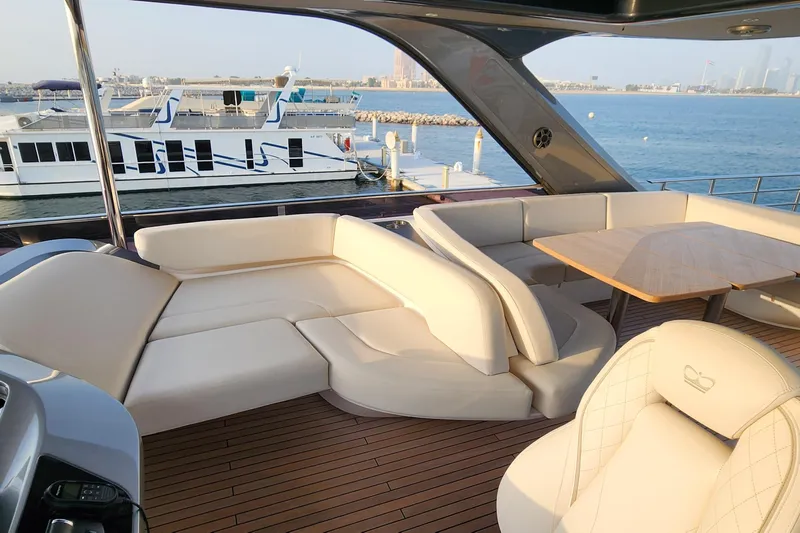  Yacht Photos Pics Luxurious seating area on 2025 Princess Y72 Motor Yacht, docked with ocean view.