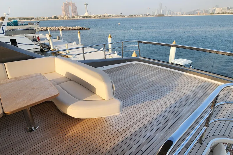  Yacht Photos Pics Luxurious deck of 2025 Princess Y72 Motor Yacht with scenic waterfront view.