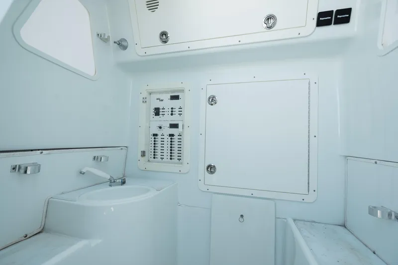  Yacht Photos Pics 2017 SeaVee 390Z boat interior with control panel and sink.