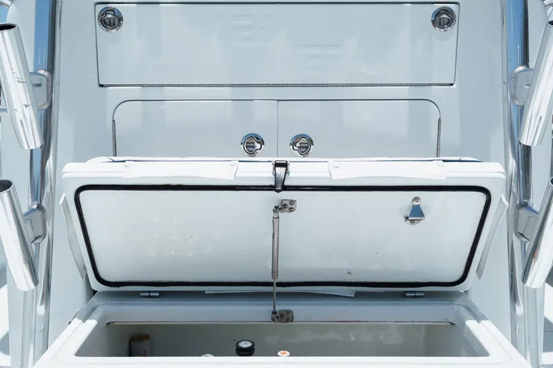  Yacht Photos Pics Open storage compartment on a 2017 SeaVee 390Z boat, showcasing interior details.