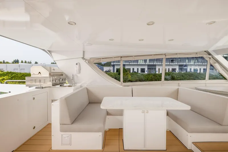  Yacht Photos Pics Luxurious yacht interior with seating area and grill, Primorets Custom 2010 model.