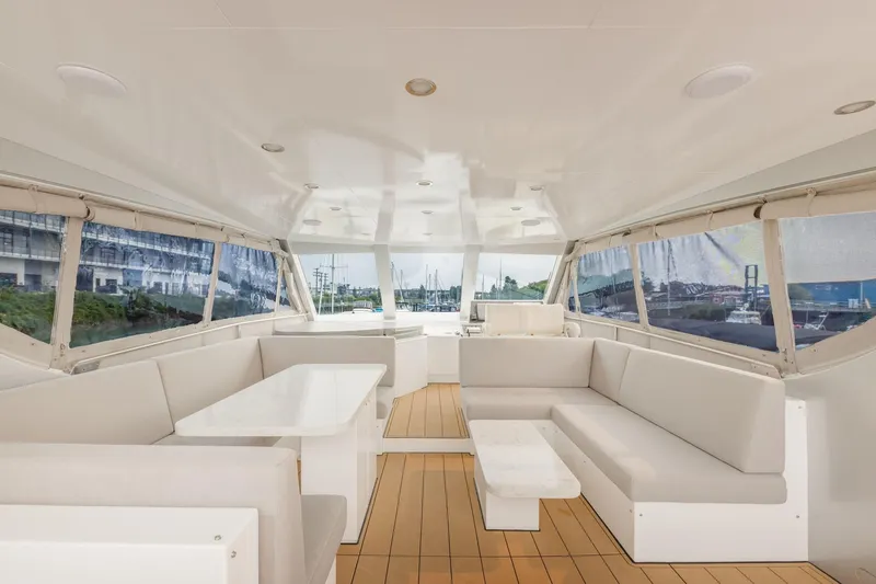  Yacht Photos Pics Spacious interior of 2010 Primorets Custom yacht with white seating and large windows.