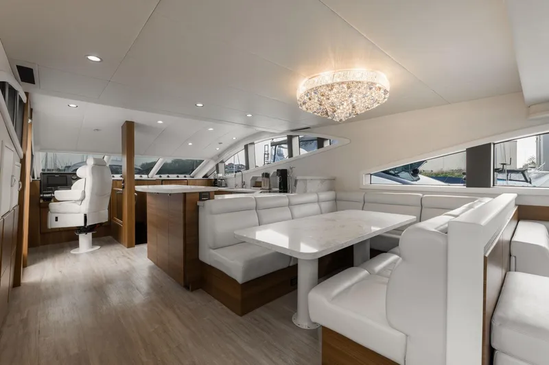  Yacht Photos Pics Luxurious 2010 Primorets Custom yacht interior with elegant seating and chandelier.
