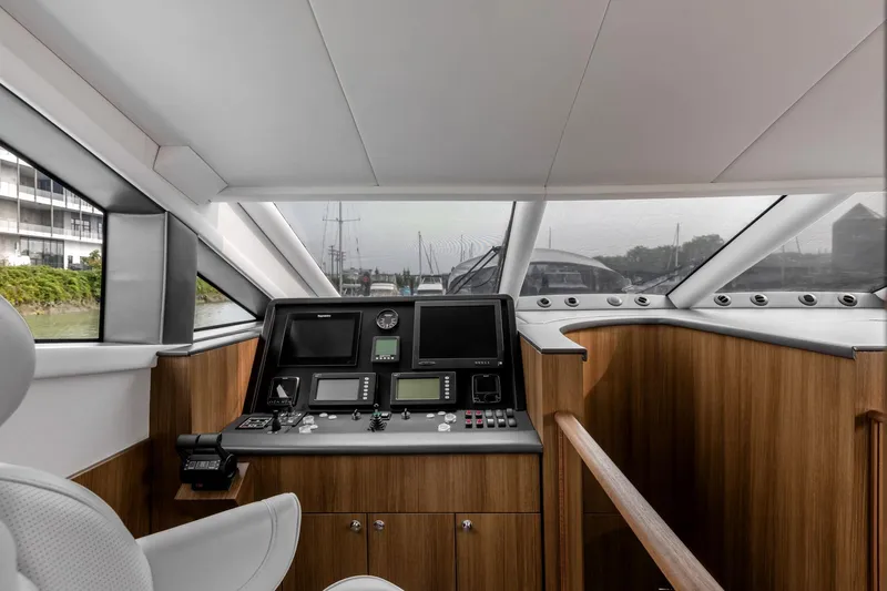  Yacht Photos Pics Interior of 2010 Primorets Custom yacht with modern navigation controls and wooden paneling.