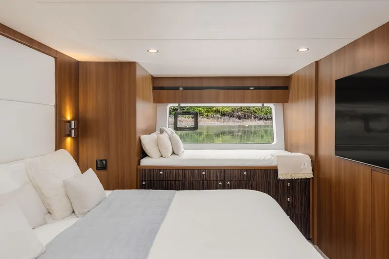  Yacht Photos Pics Luxurious Primorets Custom 2010 yacht bedroom with wood paneling and large window view.