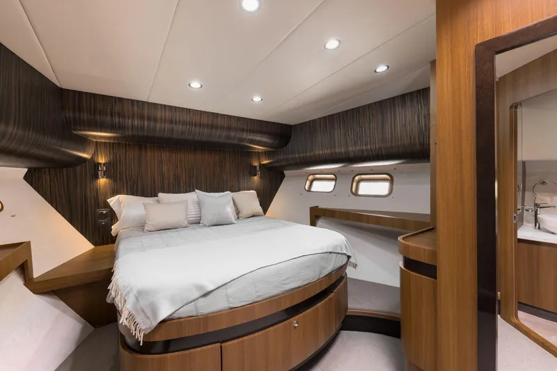  Yacht Photos Pics Luxurious Primorets Custom 2010 yacht bedroom with modern wood paneling and elegant lighting.