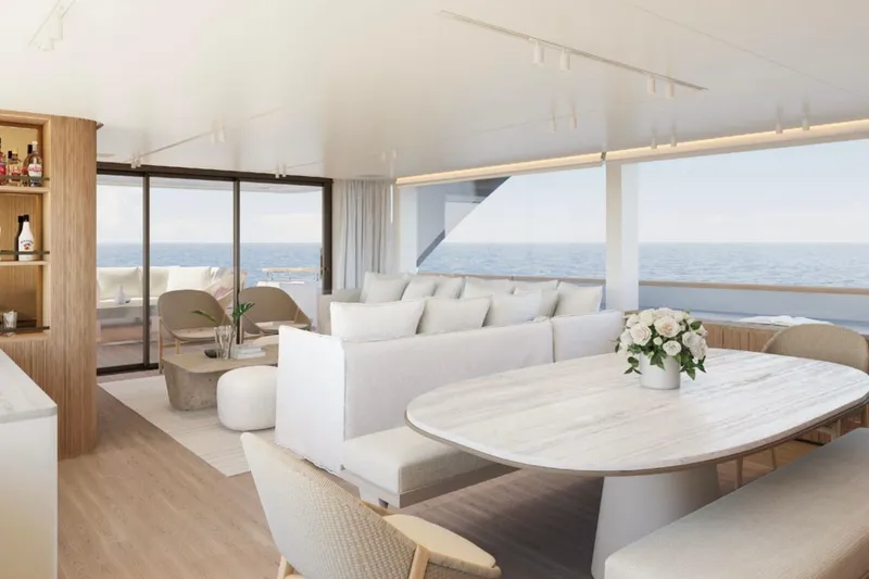  Yacht Photos Pics Luxurious interior of 2025 Sanlorenzo SD90 yacht with ocean view and elegant furnishings.