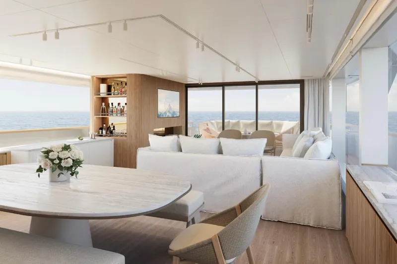  Yacht Photos Pics Luxurious interior of 2025 Sanlorenzo SD90 yacht with elegant furnishings and ocean view.