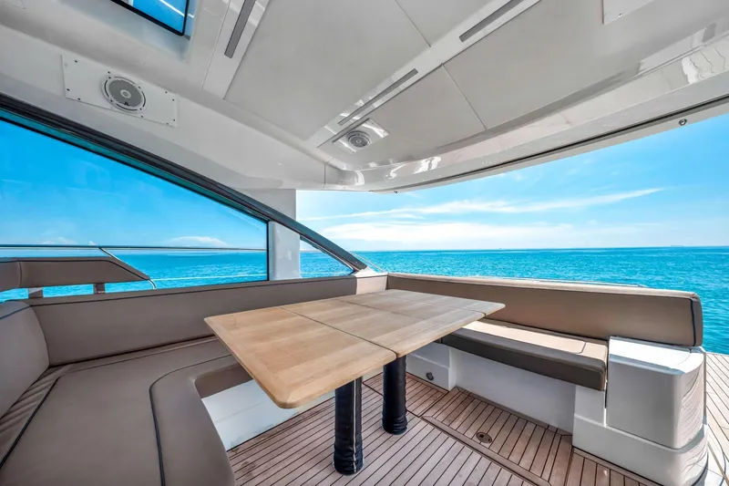 Karisa Yacht Photos Pics Luxurious 2018 Fairline Targa 53 OPEN yacht interior with ocean view and elegant seating area.