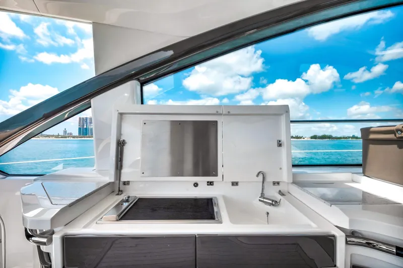Karisa Yacht Photos Pics Luxury yacht kitchen on 2018 Fairline Targa 53 OPEN with ocean view.