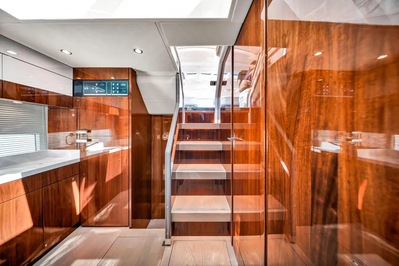 Karisa Yacht Photos Pics Luxurious interior of 2018 Fairline Targa 53 OPEN yacht with wooden finishes and modern design.
