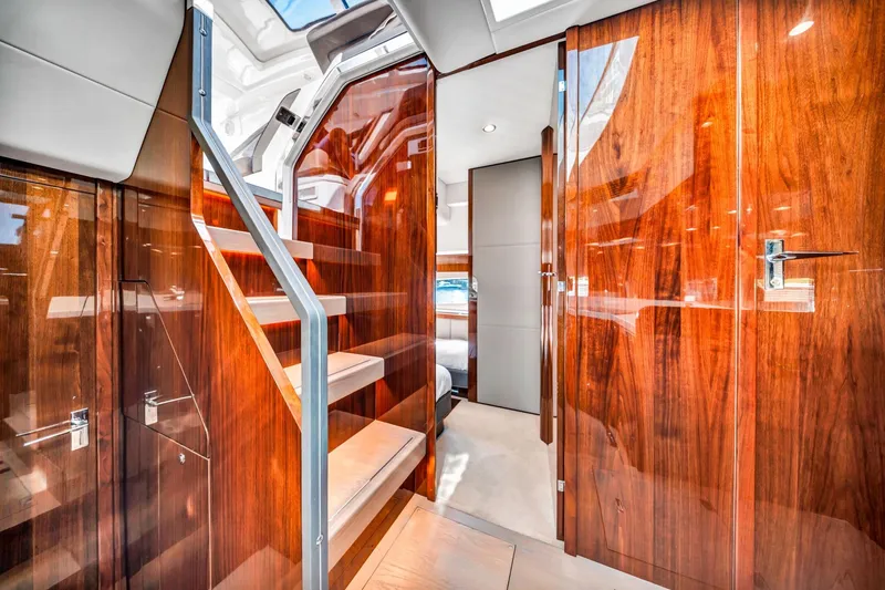 Karisa Yacht Photos Pics Luxurious interior of 2018 Fairline Targa 53 OPEN yacht with polished wood finishes.