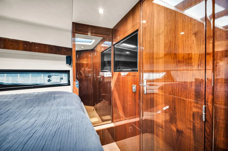 Karisa Yacht Photos Pics Luxurious interior of 2018 Fairline Targa 53 OPEN yacht with polished wood finishes.