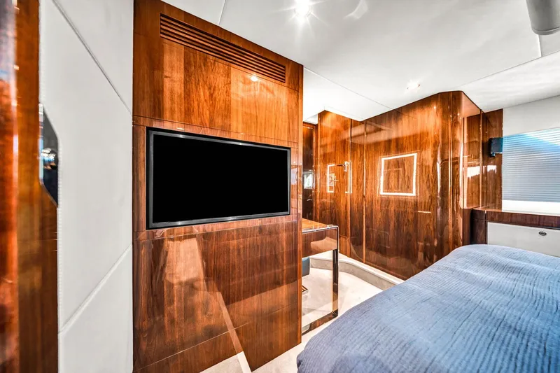 Karisa Yacht Photos Pics Luxurious interior of 2018 Fairline Targa 53 OPEN yacht with wood paneling and modern amenities.