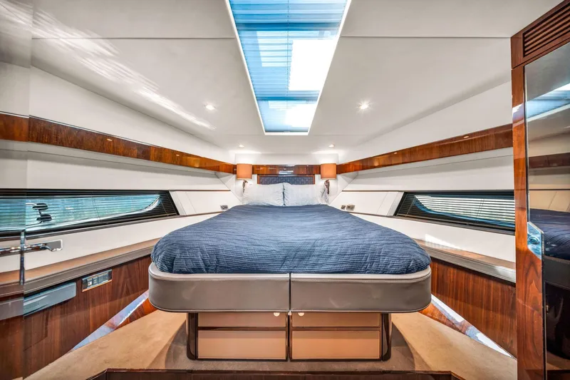 Karisa Yacht Photos Pics Luxurious cabin interior of 2018 Fairline Targa 53 OPEN yacht with skylight and elegant wood finishes.