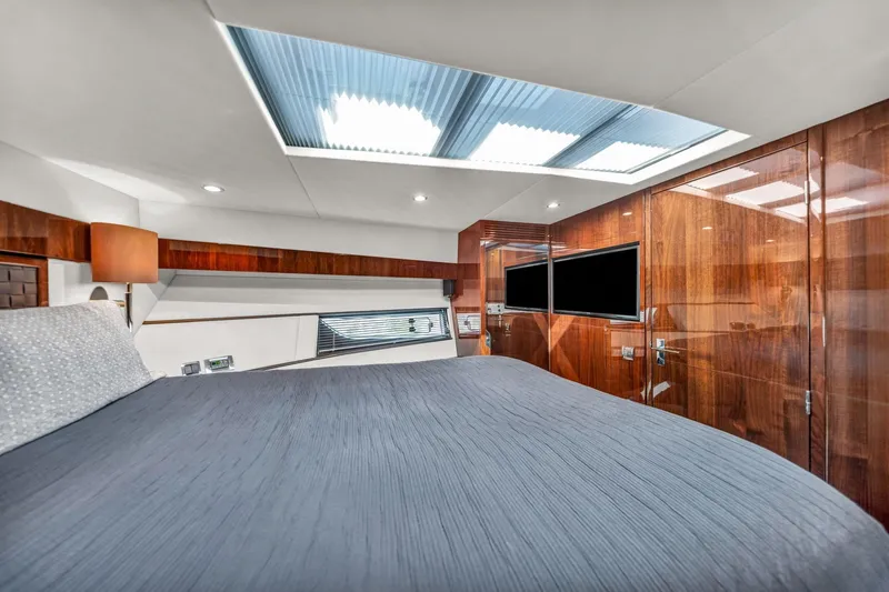 Karisa Yacht Photos Pics Luxurious cabin interior of 2018 Fairline Targa 53 OPEN yacht with skylight and modern amenities.