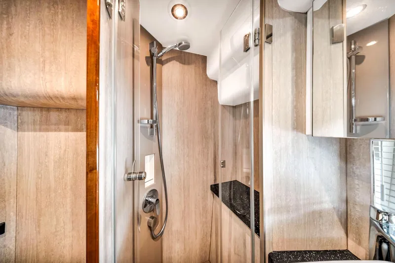 Karisa Yacht Photos Pics Luxurious bathroom interior of 2018 Fairline Targa 53 OPEN yacht, featuring modern shower design.