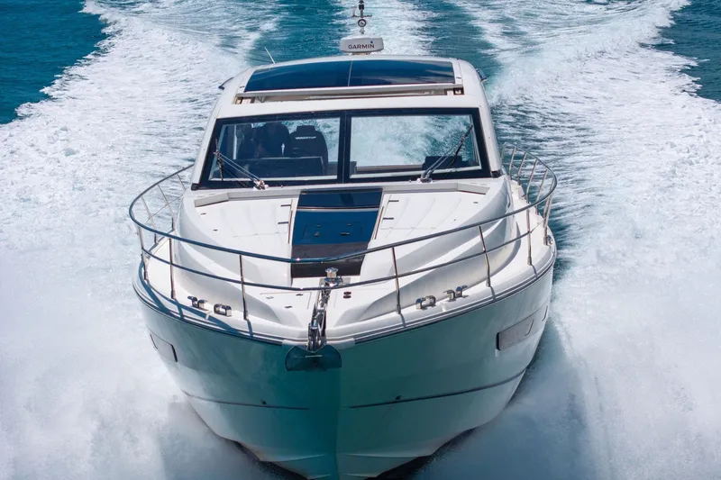 Karisa Yacht Photos Pics 2018 Fairline Targa 53 OPEN yacht cruising on open water, front view.