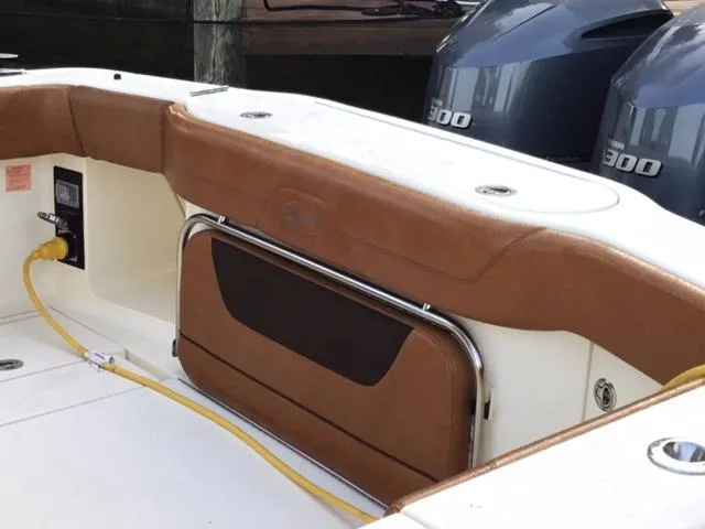  Yacht Photos Pics 2016 Scout 350 LXF boat interior with brown seating and dual 300 horsepower engines.