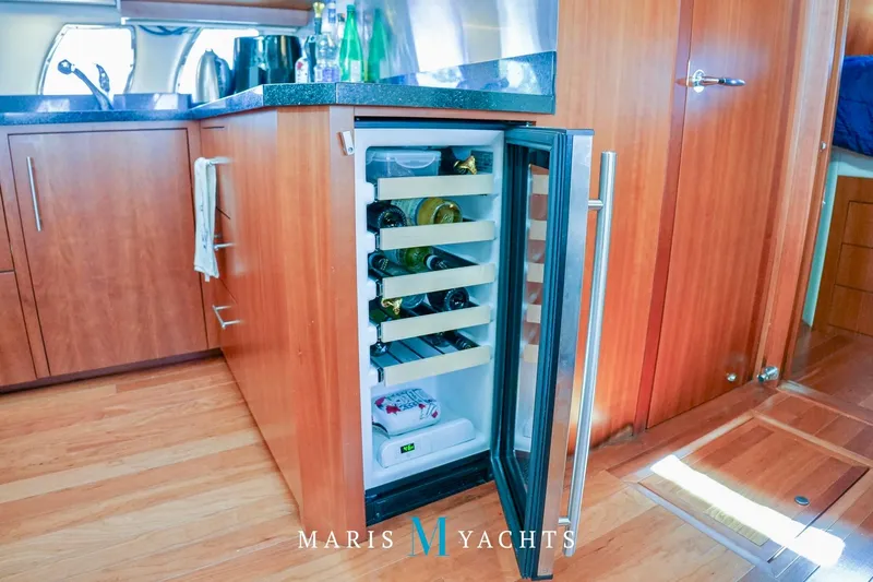  Yacht Photos Pics Luxury yacht kitchen with open wine cooler, Regal 52 Sport Coupe, 2009 model.