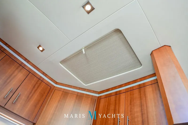  Yacht Photos Pics Ceiling view of 2009 Regal 52 Sport Coupe yacht interior with wood cabinetry.