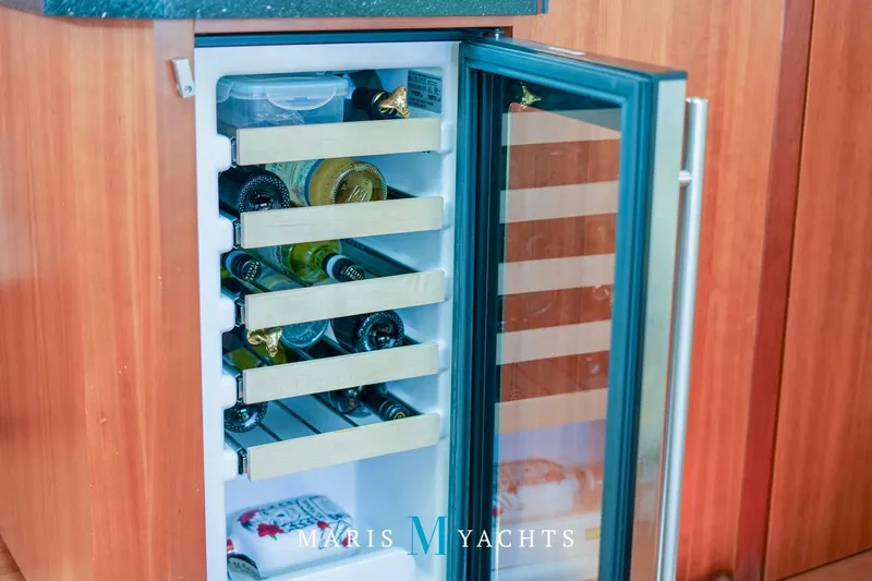  Yacht Photos Pics Wine cooler with bottles inside a 2009 Regal 52 Sport Coupe yacht.