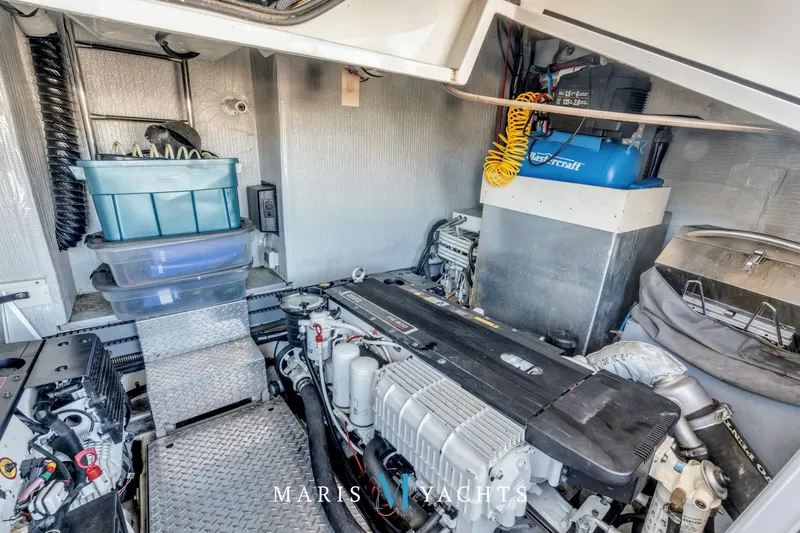  Yacht Photos Pics Engine room of 2009 Regal 52 Sport Coupe yacht with storage and equipment.
