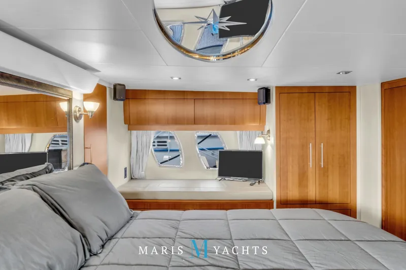  Yacht Photos Pics Luxurious 2009 Regal 52 Sport Coupe yacht interior with elegant wood finishes and modern amenities.