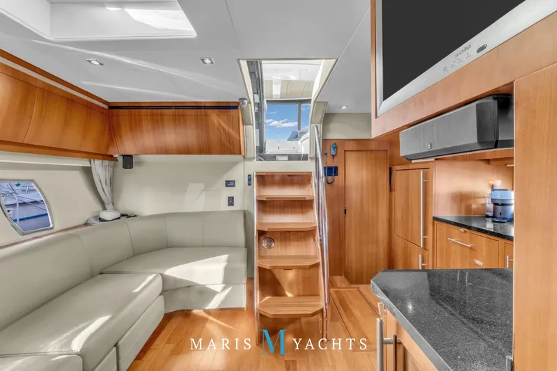 Yacht Photos Pics Luxurious interior of 2009 Regal 52 Sport Coupe yacht with modern furnishings.