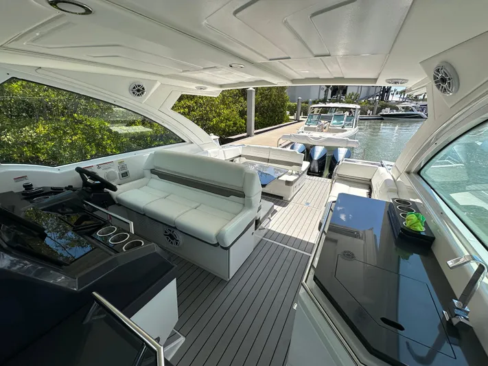 Harvest Time Yacht Photos Pics 2022 Formula 380 Super Sport Crossover interior with sleek seating and modern amenities.