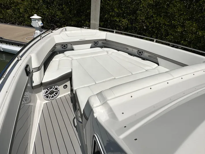 Harvest Time Yacht Photos Pics 2022 Formula 380 Super Sport Crossover boat with spacious white seating area.