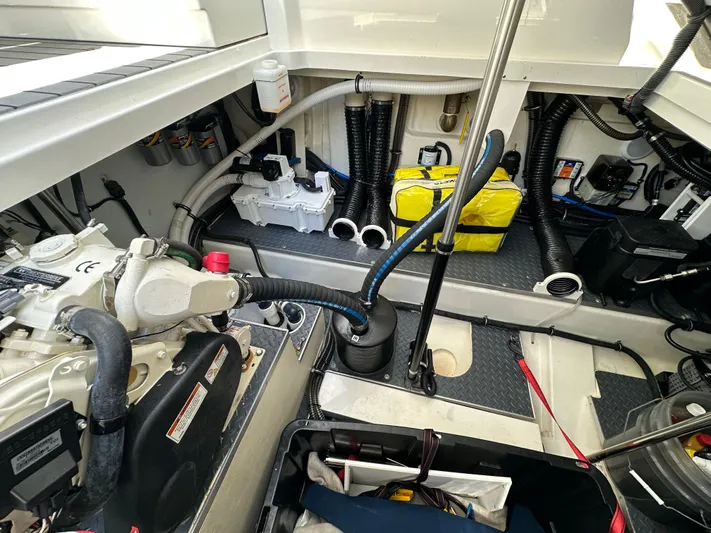Harvest Time Yacht Photos Pics Engine compartment of 2022 Formula 380 Super Sport Crossover with visible components and wiring.
