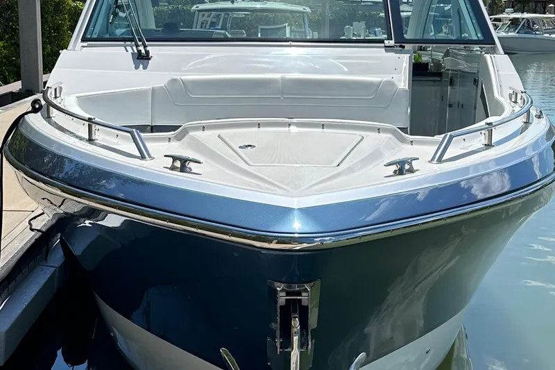Harvest Time Yacht Photos Pics 2022 Formula 380 Super Sport Crossover boat docked, showcasing sleek design and modern features.