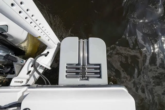  Yacht Photos Pics 2024 Islamorada Boatworks 24, rear deck view, featuring sleek design and water reflection.