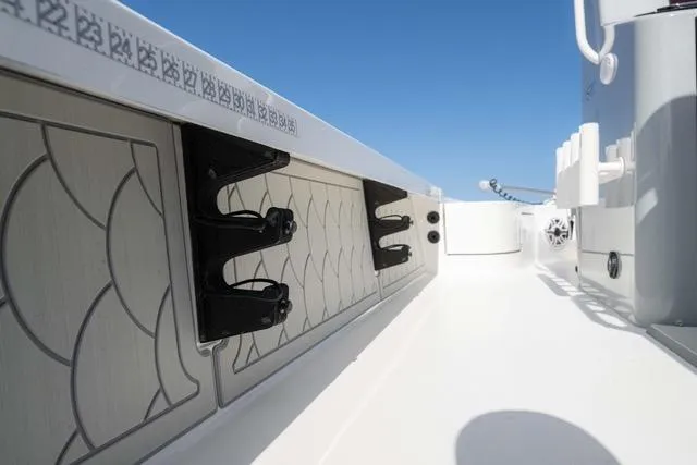  Yacht Photos Pics 2024 Islamorada Boatworks 24 interior, featuring sleek design and modern fittings under clear blue sky.