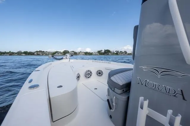  Yacht Photos Pics 2024 Islamorada Boatworks 24 on water, showcasing sleek design and modern features.