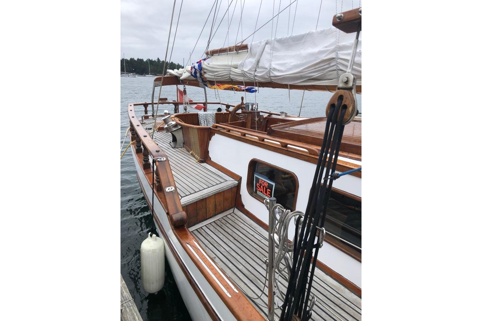 1966 Allen Mackay Gaff Rigged Top Sail Schooner for sale, docked in harbor.