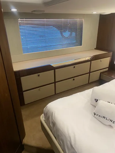 Waypoint Yacht Photos Pics 2024 Fairline Squadron 50 interior with modern cabinetry and window blinds.
