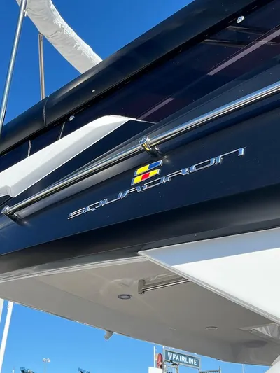 Waypoint Yacht Photos Pics 2024 Fairline Squadron 50 yacht, sleek design, close-up view, blue sky background.