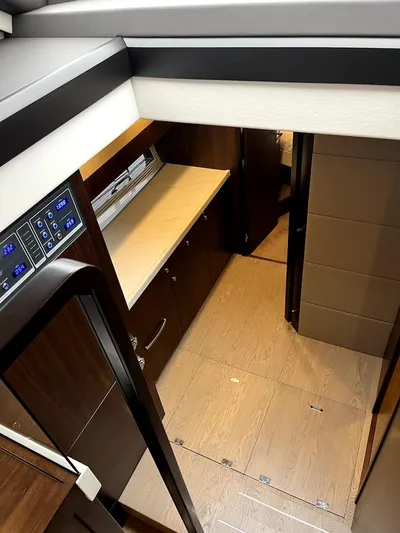 Waypoint Yacht Photos Pics 2024 Fairline Squadron 50 yacht interior with modern wood finishes and sleek design.