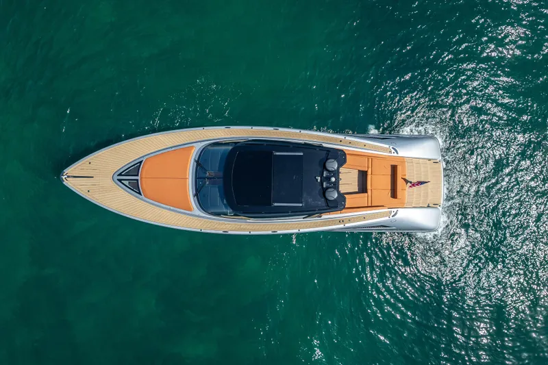 Why Her Yacht Photos Pics Aerial view of 2024 Wajer 55 HT yacht on turquoise water.