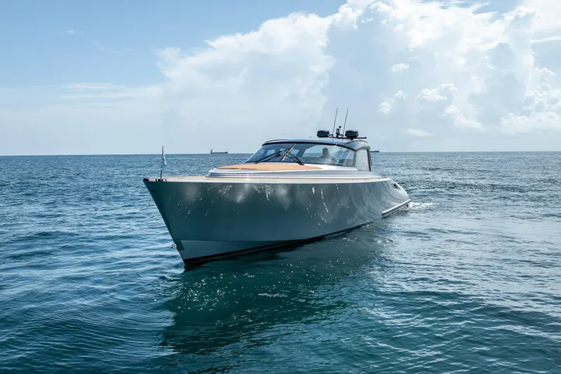 Why Her Yacht Photos Pics 2024 Wajer 55 HT yacht cruising on open sea under a bright sky.