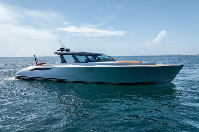 Why Her Yacht Photos Pics 2024 Wajer 55 HT yacht cruising on open sea under clear blue sky.