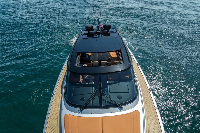 Why Her Yacht Photos Pics 2024 Wajer 55 HT luxury yacht cruising on open water, top view.