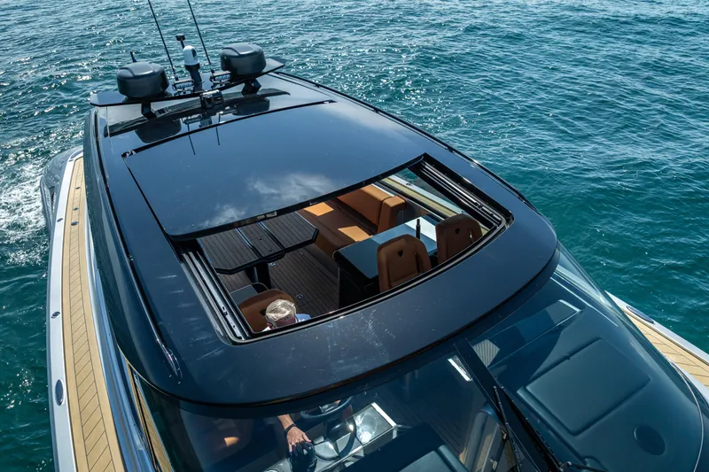 Why Her Yacht Photos Pics 2024 Wajer 55 HT yacht with open sunroof cruising on the ocean.