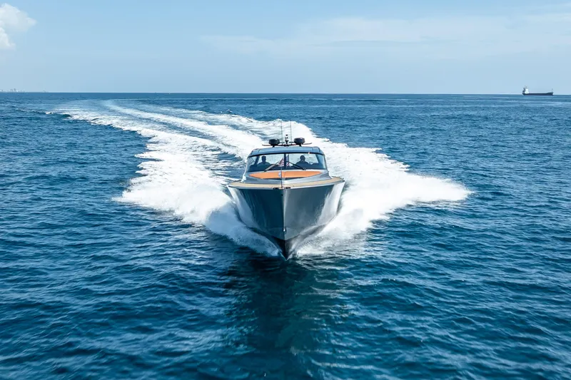 Why Her Yacht Photos Pics 2024 Wajer 55 HT yacht cruising on open sea, leaving a trail of white wake.