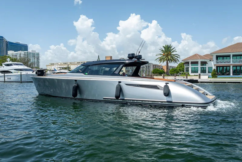 Why Her Yacht Photos Pics 2024 Wajer 55 HT luxury yacht cruising in a scenic waterfront setting.